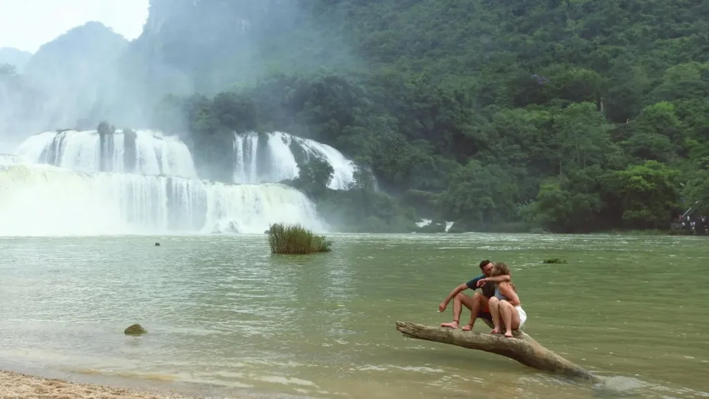 A beautiful wide view of Ban Gioc Waterfall with green trees
