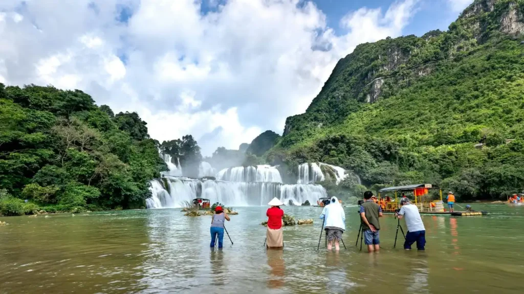 A beautiful wide view of Ban Gioc Waterfall with green trees