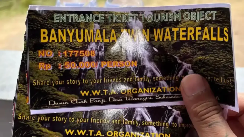 The entrance gate and ticket counter of Banyumala Waterfall showing 2026 pricing