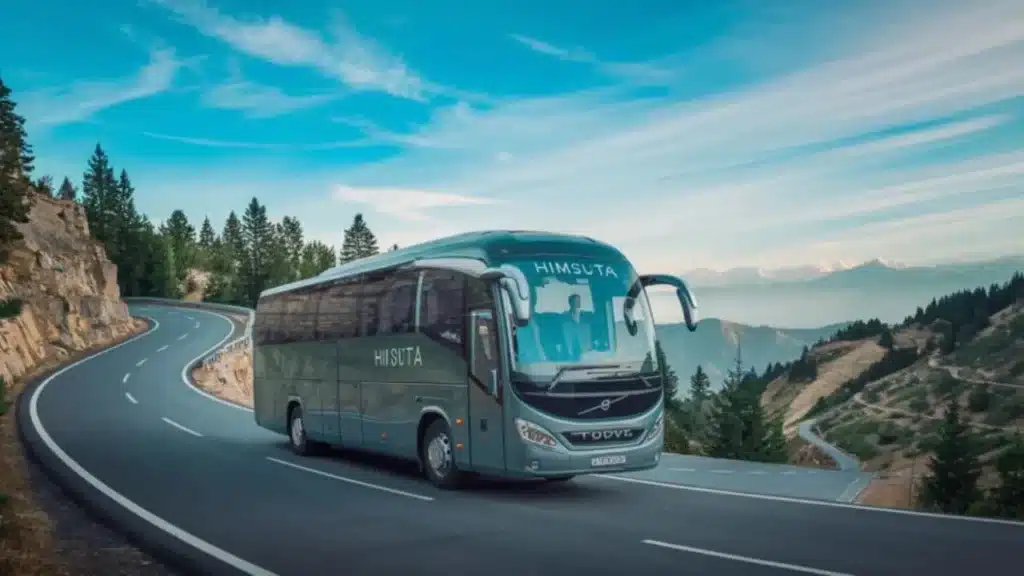 An AC Volvo bus traveling on the scenic highway from Delhi to Manali.