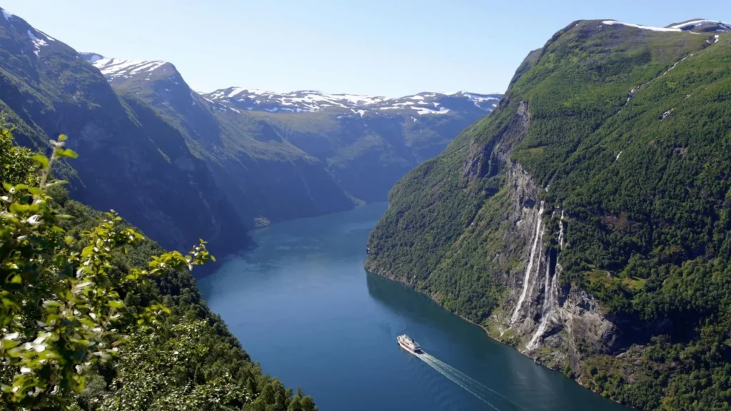 A majestic front view of the Seven Sisters Waterfall cascading down the limestone cliffs in Cherrapunji